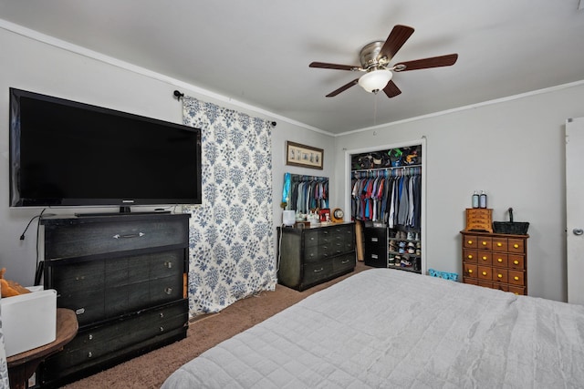 carpeted bedroom with ornamental molding, a closet, and ceiling fan