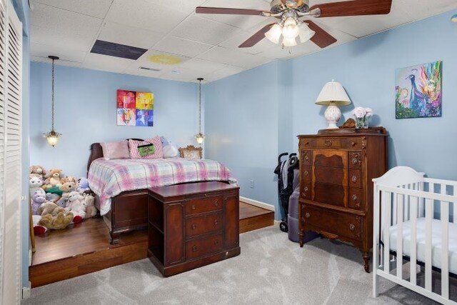  - bedroom featuring carpet flooring and ceiling fan