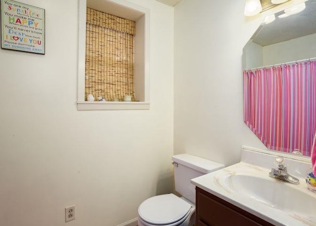  - bathroom with vanity and toilet