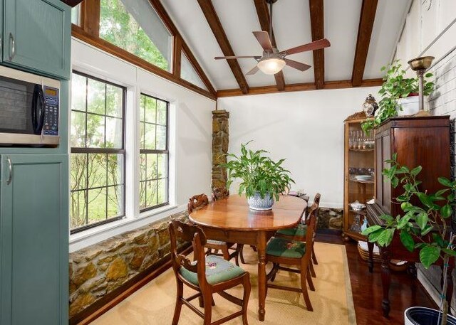  - dining room featuring ceiling fan, healthy amount of natural light, and light wood-type flooring