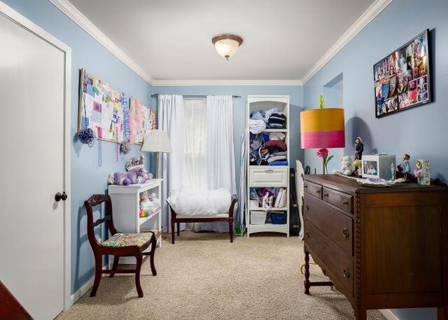  - bedroom featuring light colored carpet and crown molding