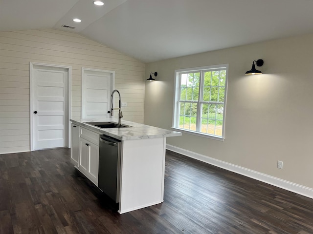 kitchen featuring white cabinetry, stainless steel dishwasher, a center island with sink, and sink