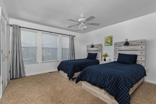 bedroom with carpet flooring and ceiling fan