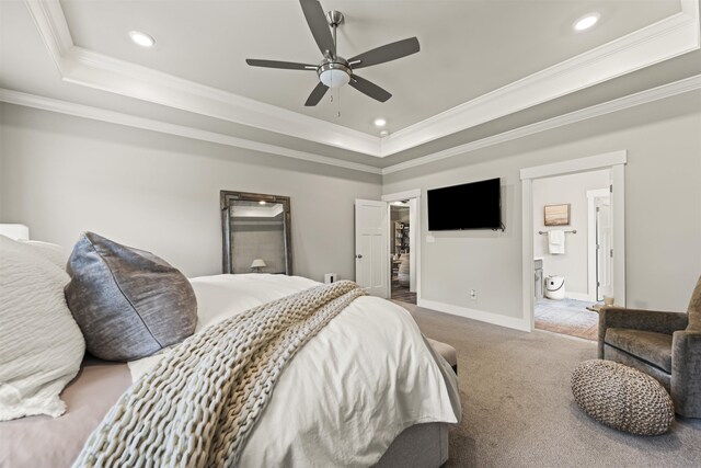  - carpeted bedroom with a tray ceiling, ornamental molding, baseboards, recessed lighting, and ceiling fan