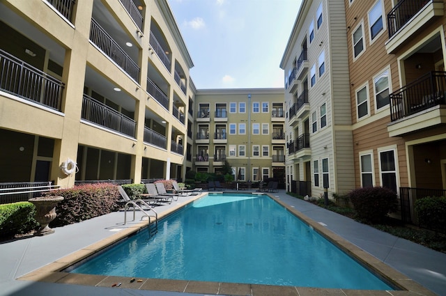 pool with a patio area