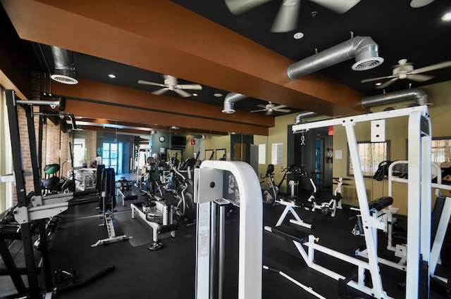 workout area with visible vents and ceiling fan