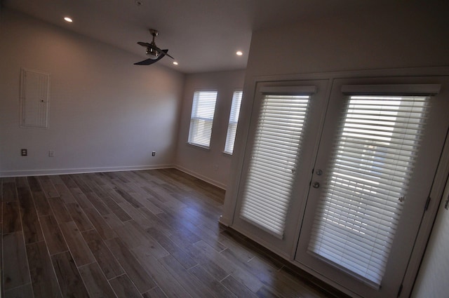 interior space featuring dark wood-type flooring, electric panel, recessed lighting, and french doors