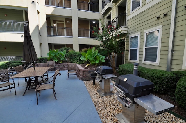 view of patio featuring area for grilling and outdoor dining space