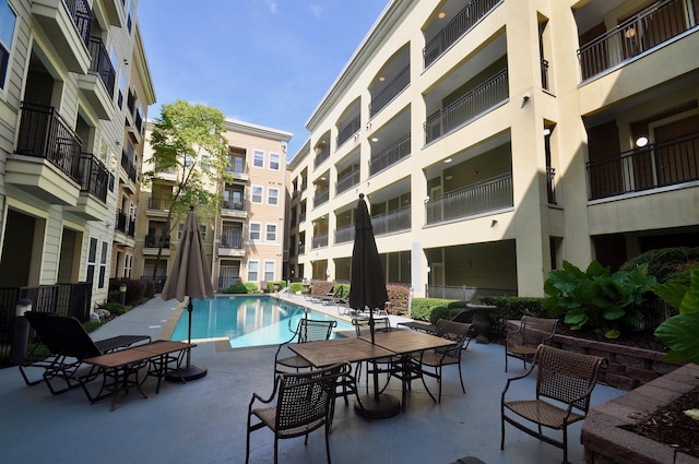 pool featuring a patio area