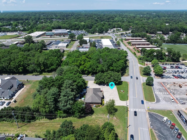  - drone / aerial view of a heavily wooded area
