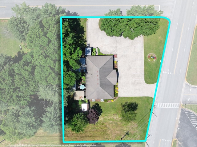  - aerial view of property and surrounding area with property boundaries highlighted