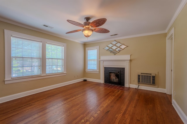  - unfurnished living room featuring a fireplace with flush hearth, dark wood-style floors, ceiling fan, ornamental molding, and baseboards