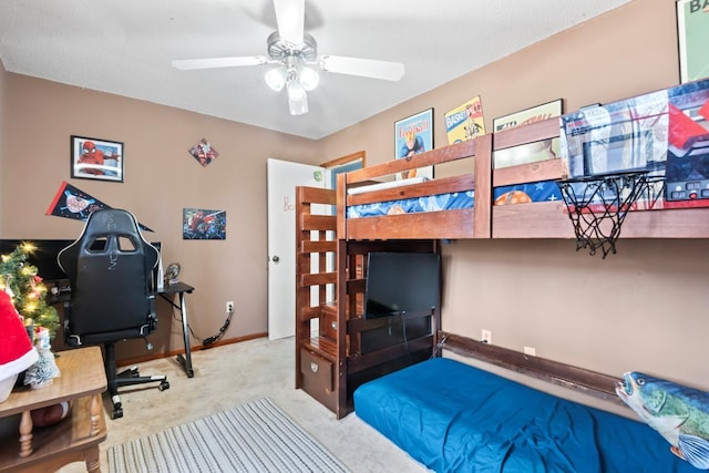 bedroom featuring ceiling fan and light colored carpet