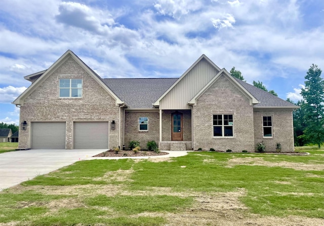 craftsman house featuring a garage and a front yard