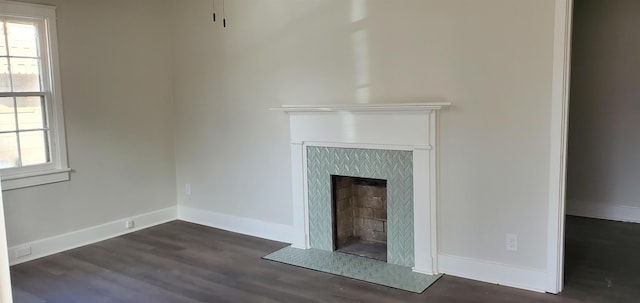 interior details with hardwood / wood-style floors and a high end fireplace