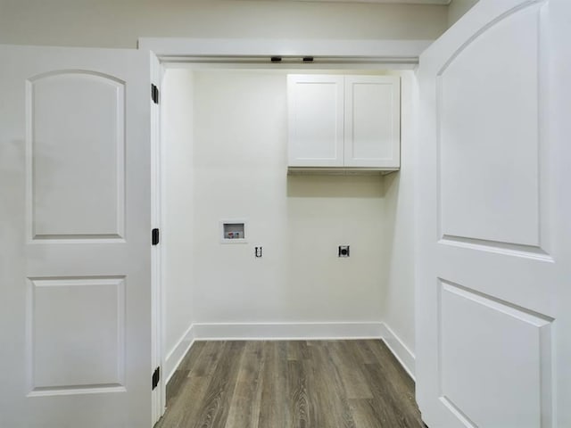 laundry room featuring dark wood-type flooring, cabinets, washer hookup, and hookup for an electric dryer