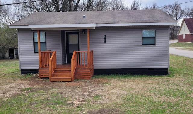 view of front of home featuring a front lawn