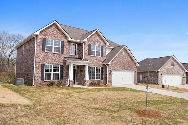 view of front facade featuring brick siding, cooling unit, driveway, and a front yard