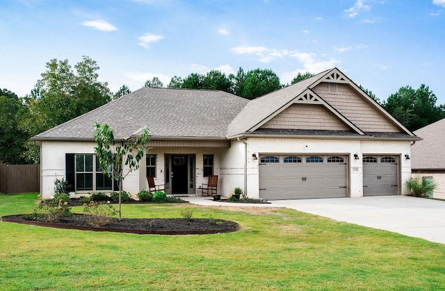 craftsman house with covered porch, a front yard, and a garage