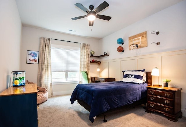 carpeted bedroom featuring ceiling fan