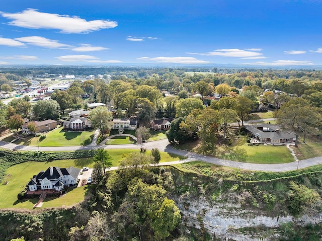  - aerial view of property and surrounding area with nearby suburban area