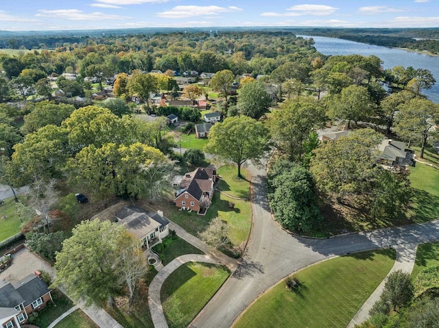  - aerial view of property's location with a nearby body of water and nearby suburban area
