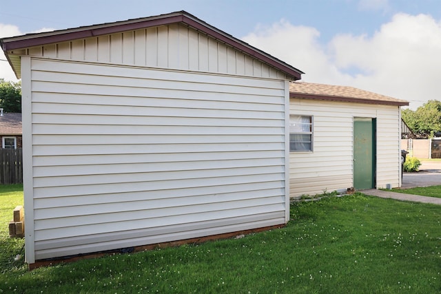 view of home's exterior with a yard