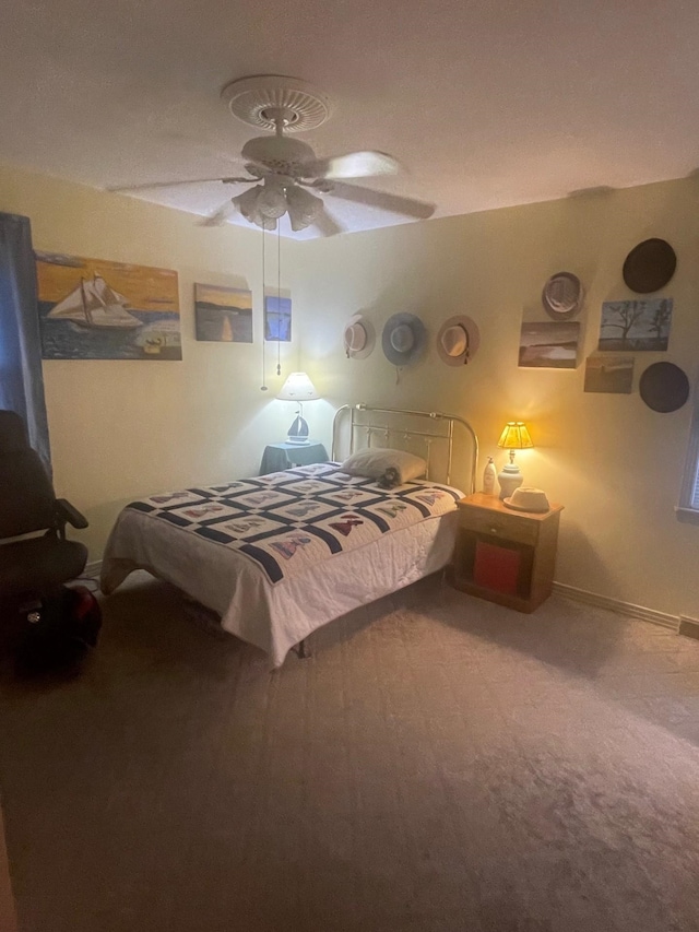 bedroom with carpet floors and ceiling fan