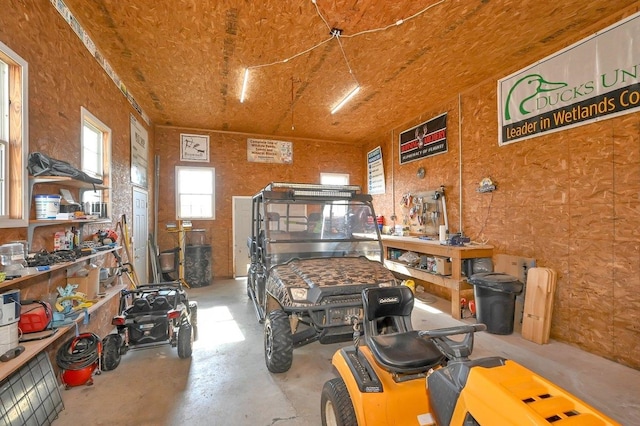 garage with a workshop area