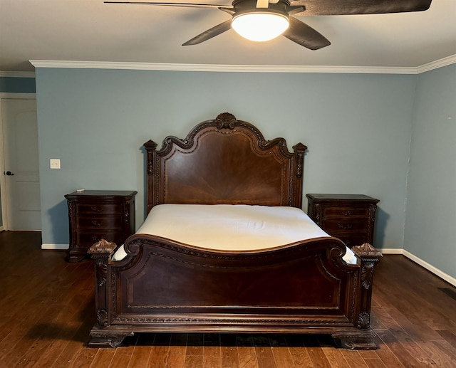 bedroom with ceiling fan, dark hardwood / wood-style flooring, and crown molding