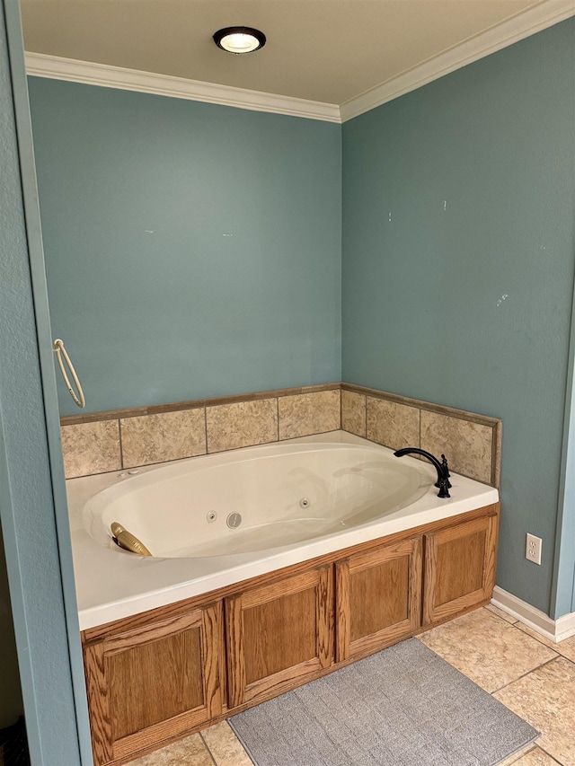 bathroom with tile patterned floors, a bathtub, and ornamental molding