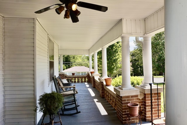 exterior space with a porch and ceiling fan