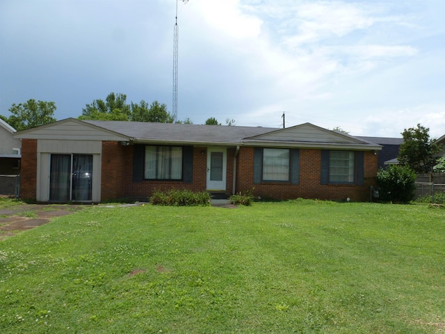 - single story home featuring brick siding