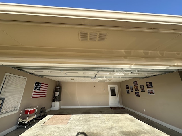 garage with baseboards