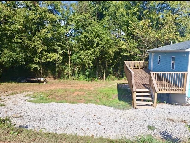 view of yard with a deck