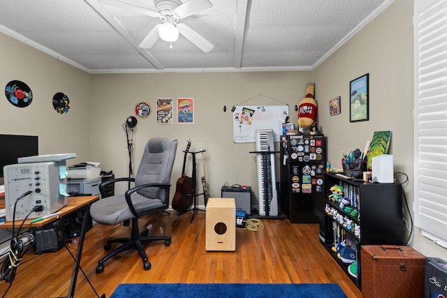 home office with ceiling fan, wood finished floors, and ornamental molding