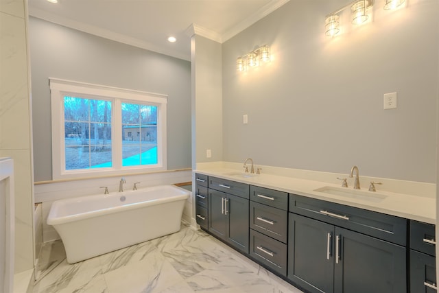 bathroom featuring vanity, ornamental molding, and a tub to relax in