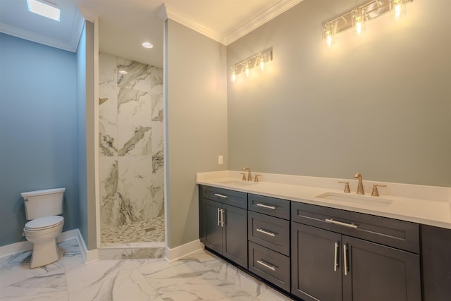 bathroom with tiled shower, ornamental molding, toilet, and vanity