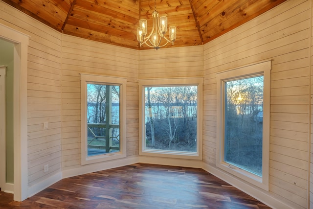 unfurnished sunroom featuring lofted ceiling, a notable chandelier, and wooden ceiling