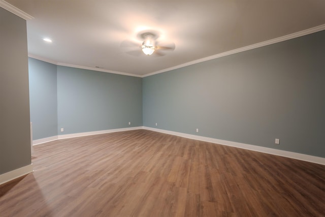 unfurnished room with crown molding and wood-type flooring