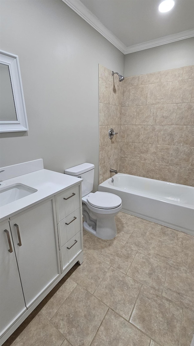 bathroom featuring ornamental molding, vanity, toilet, and bathing tub / shower combination