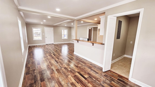 interior space with dark wood-style floors, crown molding, recessed lighting, and baseboards