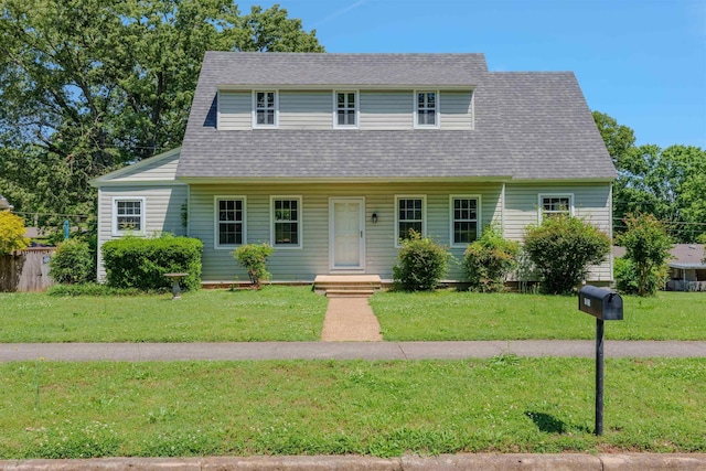 view of front of home featuring roof with shingles