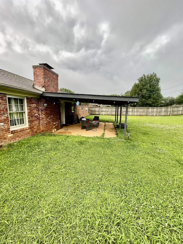  - view of yard with a patio