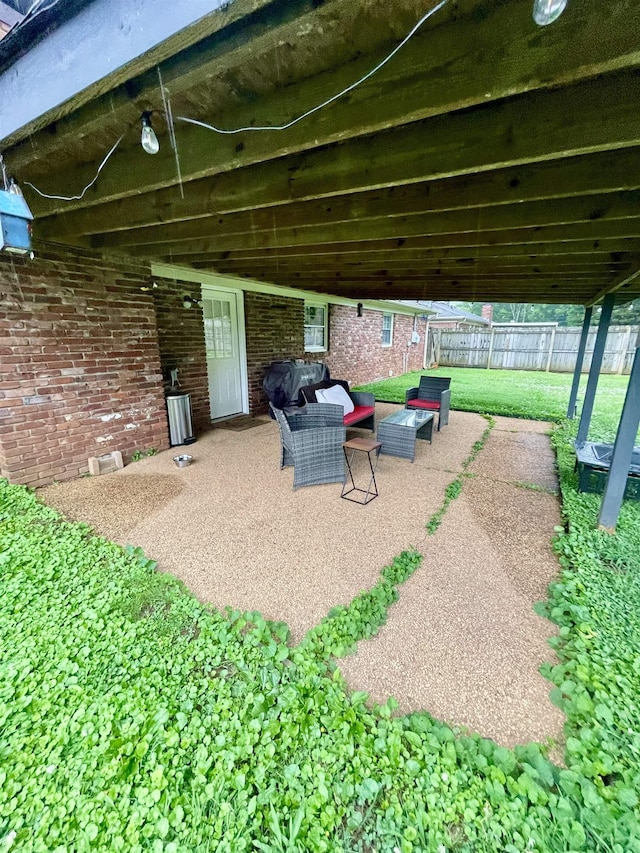 - fenced backyard with a patio area