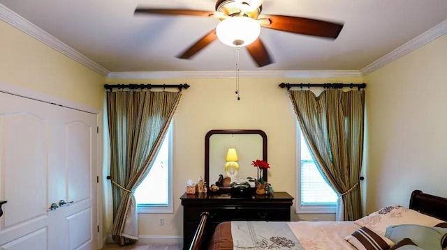 bedroom with a ceiling fan, multiple windows, and crown molding