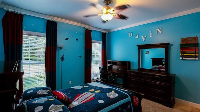 bedroom featuring crown molding, baseboards, and ceiling fan