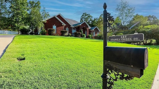 view of front of home with a front lawn