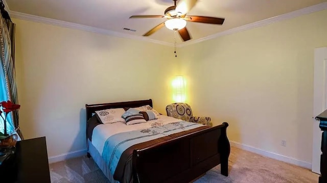 bedroom featuring baseboards, carpet, visible vents, and crown molding