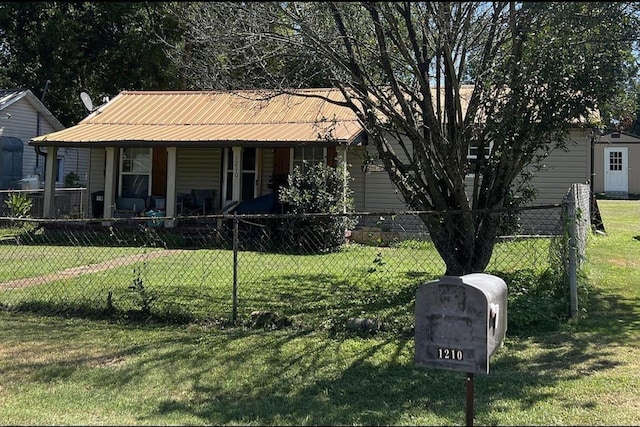 bungalow-style house with a porch and a front yard